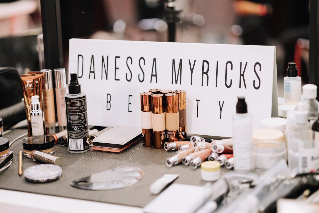 Assorted makeup products at a professional beauty station in Barcelona. Perfect for creative cosmetics enthusiasts.